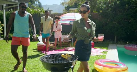Diverse Friends Enjoying Poolside BBQ