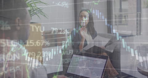 Business Meeting Overlaid with Financial Data Analytics