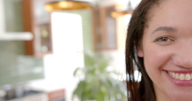 Young Woman Smiling in Bright Kitchen Interior - Download Free Stock Images Pikwizard.com