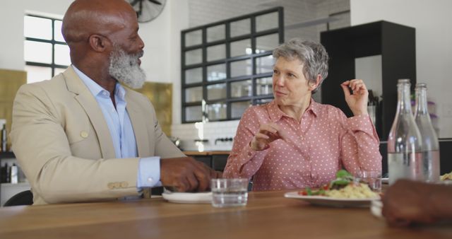 Senior Diverse Colleagues Having Discussion at Workplace Lunch Meeting - Download Free Stock Images Pikwizard.com