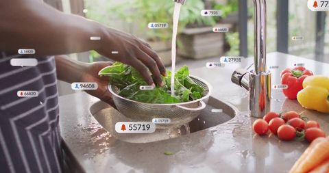 Washing Fresh Leafy Greens Under Kitchen Tap