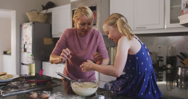 Mother and Daughter Bonding While Baking in Kitchen - Download Free Stock Images Pikwizard.com