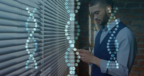Businessman checking smartphone with wireless earbud by window blinds and dna data overlay