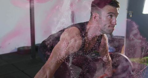 Muscular Male Performing Deadlift in Modern Gym Setting