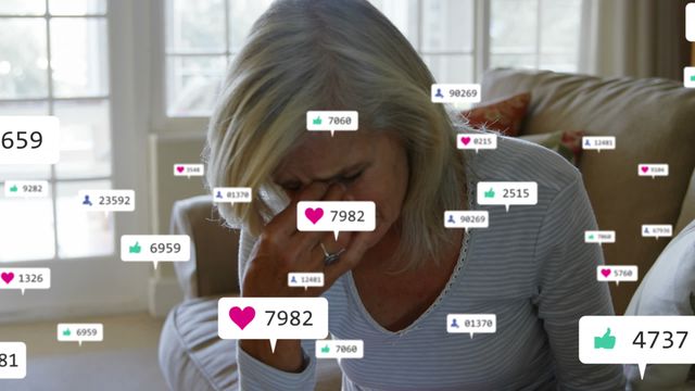 Depicts an emotional moment as a senior woman feels overwhelmed by social media notifications. Emphasizes the impact of technology on emotional wellbeing, particularly during retirement. Useful for illustrating articles on digital mental health, social media effects on older adults, or technology’s stress-inducing potential.