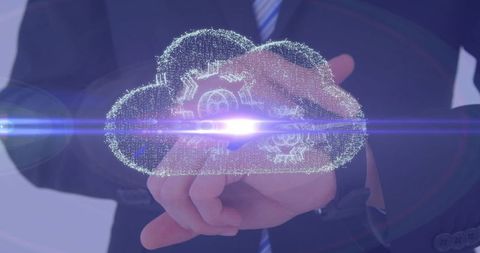 Businessman holding futuristic holographic cloud icon with gears