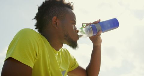 Athletic Man Drinking Water After Outdoor Exercise - Download Free Stock Images Pikwizard.com