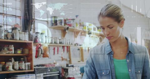 Businesswoman Analyzing Global Data in Modern Office