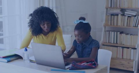 African American Mother Assisting Daughter with School Homework - Download Free Stock Images Pikwizard.com