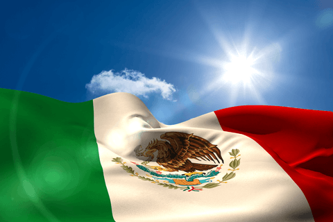 transparent mexican flag against blue sky with sun burst - Download Free Stock Videos Pikwizard.com