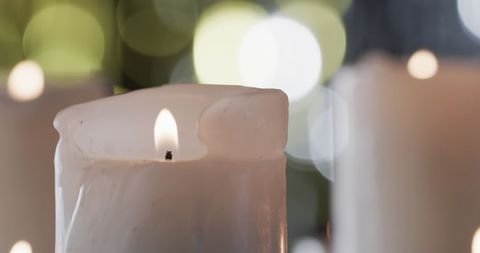 Lit Candle Wick Flickering Soft Light with a Delicate Glow