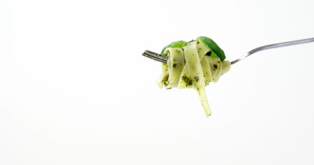 Fork with Tasty Pesto Pasta and Basil on White Background - Download Free Stock Images Pikwizard.com