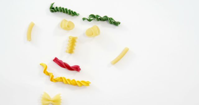 Creative Face Made with Colorful Pasta on White Background - Download Free Stock Images Pikwizard.com