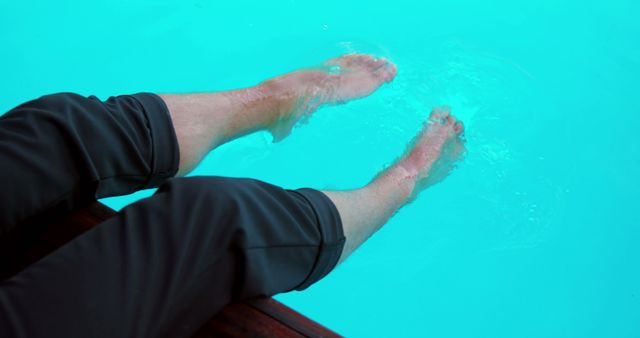 Relaxing Feet in Clear Blue Swimming Pool on Summer Day - Download Free Stock Images Pikwizard.com