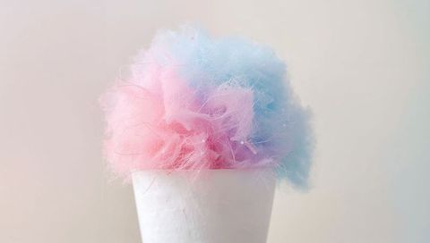Pastel Cotton Candy on White Cone Showing Soft Pink and Blue Fluff Minimal Duotone