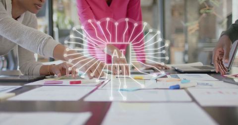 Diverse team analyzing financial data with ai integration