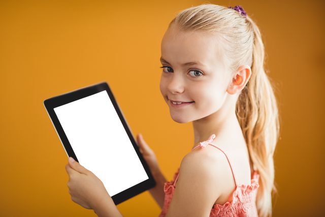 Smiling Girl Holding Transparent Digital Tablet - Download Free Stock Videos Pikwizard.com