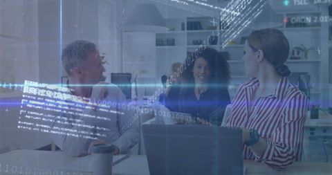 Diverse office team engaging with financial data visualization
