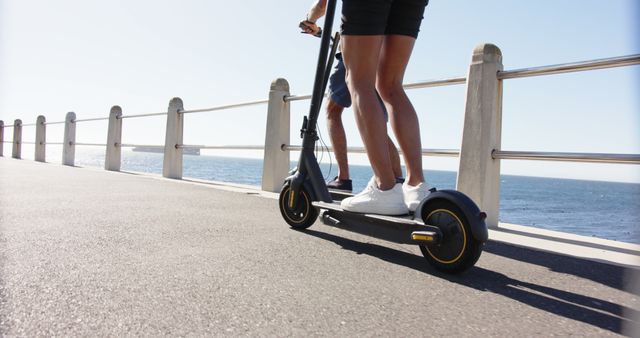Riding Electric Scooter on Coastal Path - Download Free Stock Images Pikwizard.com