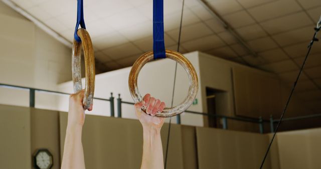 Hands Gripping Gymnastic Rings for Exercise in Indoor Gym - Download Free Stock Images Pikwizard.com