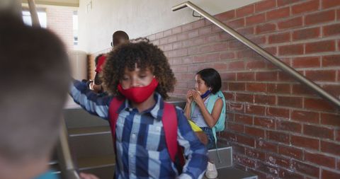 School Children Eating Breakfast on Stairwell during Pandemic
