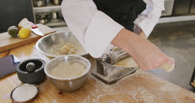 Chef Making Pasta with Flour and Dough Using Pasta Machine in Kitchen - Download Free Stock Images Pikwizard.com