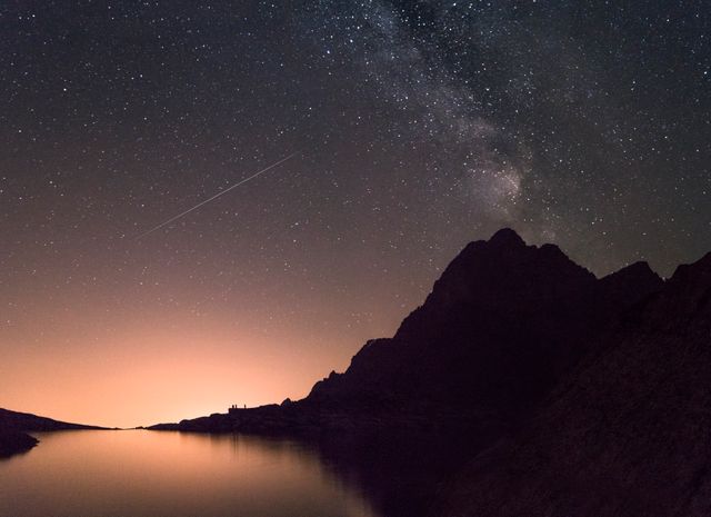 Night Sky with Milky Way and Shooting Star Over Tranquil Mountain Lake - Download Free Stock Photos Pikwizard.com