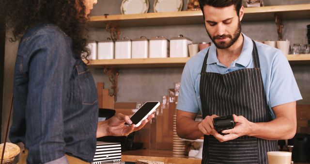 Customer Making Mobile Payment at Local Coffee Shop - Download Free Stock Images Pikwizard.com