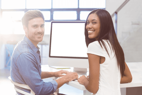 Smiling Colleagues by Office Computer with Transparent Screen - Download Free Stock Videos Pikwizard.com