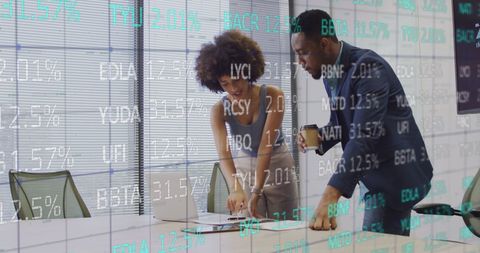 Diverse Colleagues Reviewing Financial Reports with Stock Market Overlay - Download Free Stock Images Pikwizard.com