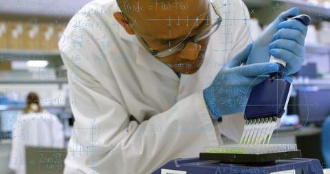 Scientist pipetting multichannel into 96-well plate for high-throughput fluorescence assay