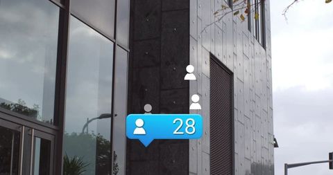 Displaying blue notification bubble showing 28 followers on modern urban office facade