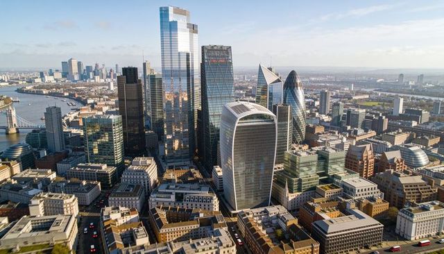 Sunlit london skyline showing city skyscrapers including gherkin and walkie talkie