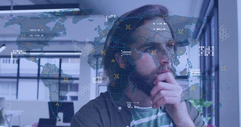 Pensive Man Reflecting on Global Business Strategies in Office