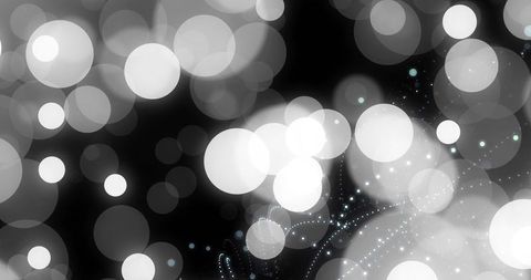 Glowing Bokeh Circles Creating Abstract Lightscape on Black