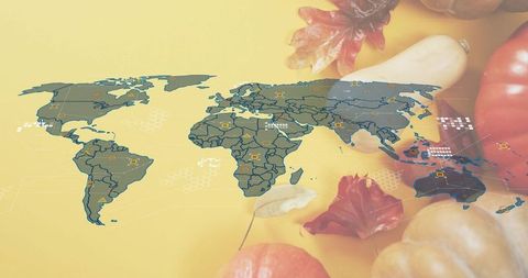 World map overlay showing autumn foliage, pumpkins and data visualization for agriculture