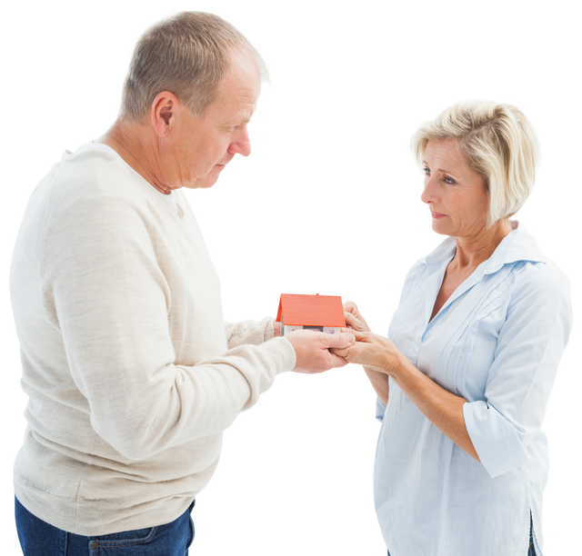 Serious Mature Couple with Transparent Model House on White Background - Download Free Stock Videos Pikwizard.com