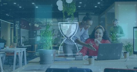 Diverse team meeting in modern office with digital hourglass overlay