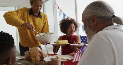 Multigenerational family celebrating american culture
