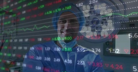 Surgeon analyzing data with technological overlay in operating room