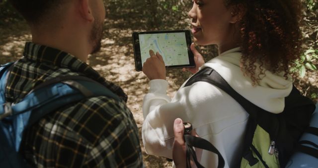 Two Friends Hiking and Navigating with Digital Tablet - Download Free Stock Images Pikwizard.com