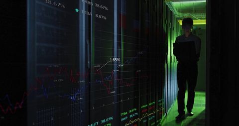 Asian IT Engineer Analyzing Data in Server Room with Projected Charts - Download Free Stock Images Pikwizard.com
