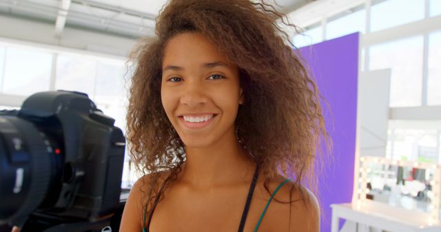 Young Woman Smiling in Photo Studio With Natural Light - Download Free Stock Images Pikwizard.com