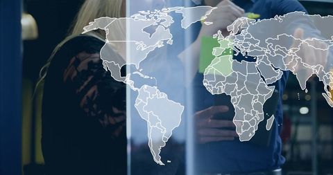 Global Business Team Collaborating with Digital World Map