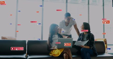 Collaborative young professionals amidst social media reminders