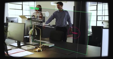Smiling businessman extending hand in modern office with ar dashboard and teamwork focus