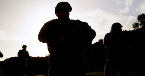 Silhouetted Soldiers in Military Combat Training - Download Free Stock Images Pikwizard.com