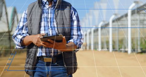 Engineer Analyzing Data on Tablet in Agricultural Setting - Download Free Stock Images Pikwizard.com