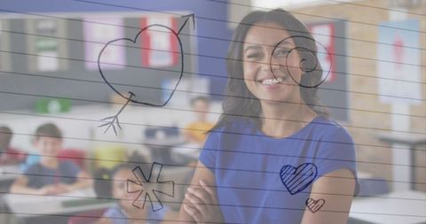 African American Female Teacher Smiling in Classroom Environment
