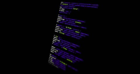 Tilted neon code column on black background with blurred edges and deep copy space